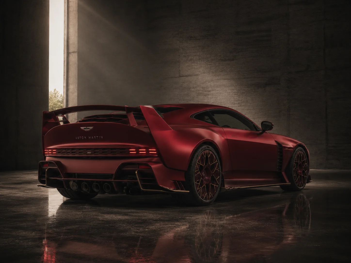 Aston Martin Valiant 2025 in Crimson Red, rear three-quarter in the atelier